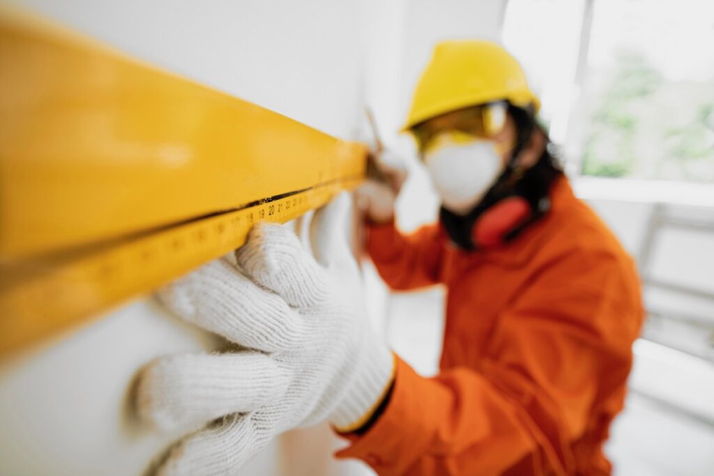 Builder wearing safety equipment