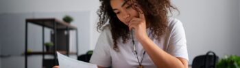 Young woman reading documents.